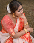 White Soft Silk with Red Contrast Zari Woven Floral Butti Durga Pooja Saree