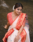 White Soft Silk with Red Contrast Zari Woven Floral Butti Durga Pooja Saree