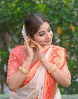 White Soft Silk with Red Contrast Zari Woven Floral Butti Durga Pooja Saree