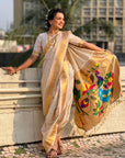 Cream Nauvari Pathani Silk Zari Woven Muniya Border Saree