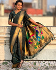 Bottle Green Nauvari Pathani Silk Zari Woven Muniya Border Saree