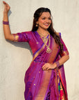 Purple Nauvari Pathani Silk Zari Woven Muniya Border Saree