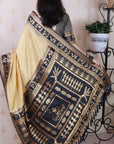 Chikoo Soft Warli Art Zari Woven Silk Saree with Contrast Border