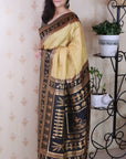 Chikoo Soft Warli Art Zari Woven Silk Saree with Contrast Border
