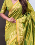 Mehendi Green Soft Zari Woven Lotus Border and Pichwai Art Pallu Silk Saree