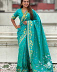 Aqua Blue Soft Zari Woven Lotus Border and Pichwai Art Pallu Silk Saree