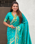 Aqua Blue Soft Zari Woven Lotus Border and Pichwai Art Pallu Silk Saree