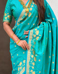 Aqua Blue Soft Zari Woven Lotus Border and Pichwai Art Pallu Silk Saree