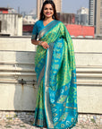Pista Green Soft Silk Zari Woven Contrast Ikkat Patola Saree