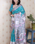Turquoise Blue Tussar Silk Madhubani Fusion Floral Printed Saree with Zari Woven Border