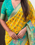 Yellow Soft Silk Zari Woven Contrast Ikkat Patola Saree