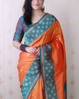Orange Soft Banarasi Silk Zari Work Saree with Flower Pattern Border