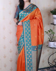 Orange Soft Banarasi Silk Zari Work Saree with Flower Pattern Border