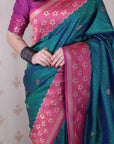 Peacock Blue Soft Banarasi Silk Zari Work Saree with Flower Pattern Border
