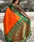 Orange Soft Silk with Zari Woven Tilak Contrast South Saree
