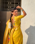 Yellow Nauvari Pathani Silk Zari Woven Muniya Border Saree