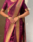 Wine Nauvari Pathani Silk Zari Woven Muniya Border Saree