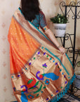 Orange Bandhani Weaves Silk Saree with Classic Border & Peacock Pallu