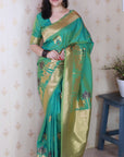 Sea Green Soft Silk Zari Woven Cow and Tree Pattern Saree