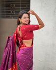 Wine Rajhans Paithani Silk Contrast Zari Woven Saree