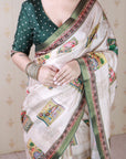 Bottle Green Tussar Silk Detailed Kalamkari Figure Printed Saree with Zari Woven Border