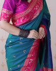 Peacock Blue Soft Warli Art Zari Woven Silk Saree with Contrast Border