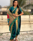 Peacock Blue Nauvari Pathani Silk Zari Woven Muniya Border Saree