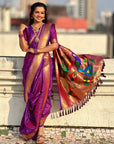 Purple Nauvari Pathani Silk Zari Woven Muniya Border Saree