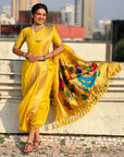 Yellow Nauvari Pathani Silk Zari Woven Muniya Border Saree