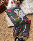 Decorative scarf with a goat design on a textured surface