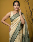 Cream & Green Soft Handloom with detailed Motifs Silk Saree