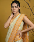 Cream & Yellow Soft Handloom with detailed Motifs Silk Saree