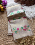 Beige fabric with floral patterns on a textured surface