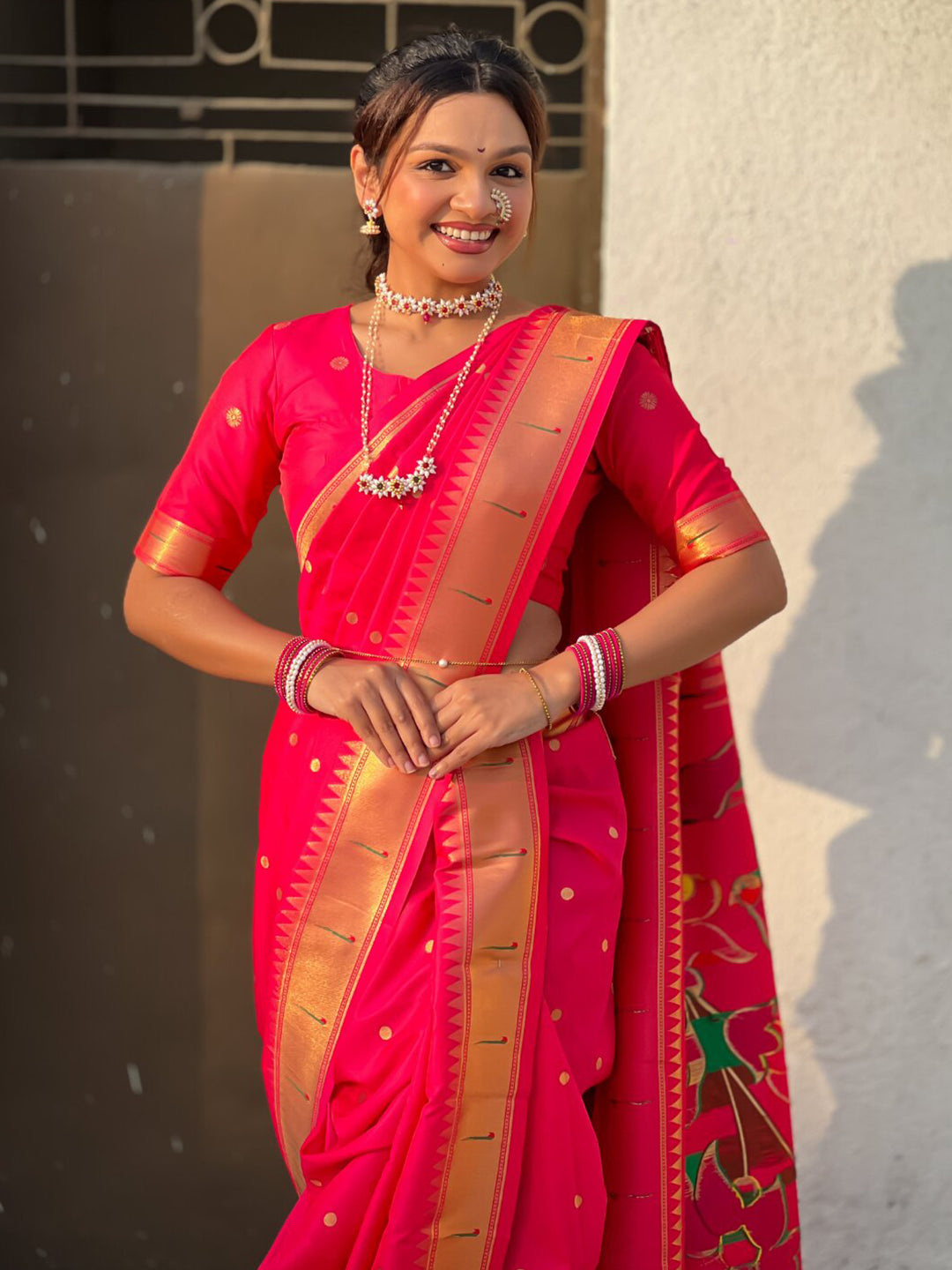 Rani Pink Nauvari Pathani Silk Zari Woven Muniya Border Saree