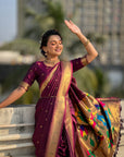 Wine Nauvari Pathani Silk Zari Woven Muniya Border Saree