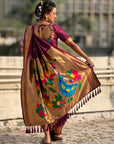 Wine Nauvari Pathani Silk Zari Woven Muniya Border Saree