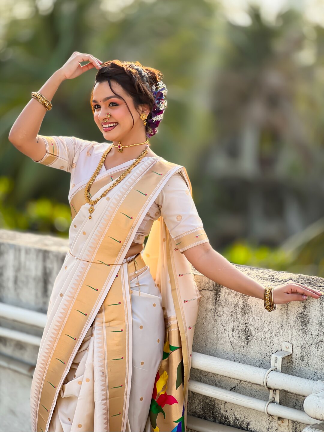 Cream Nauvari Pathani Silk Zari Woven Muniya Border Saree