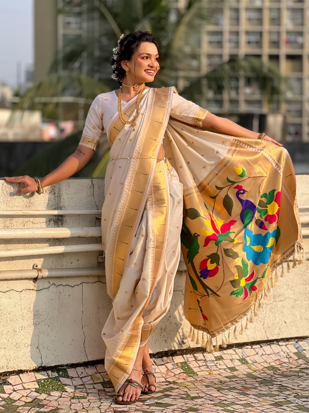 Cream Nauvari Pathani Silk Zari Woven Muniya Border Saree