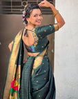 Bottle Green Nauvari Pathani Silk Zari Woven Muniya Border Saree