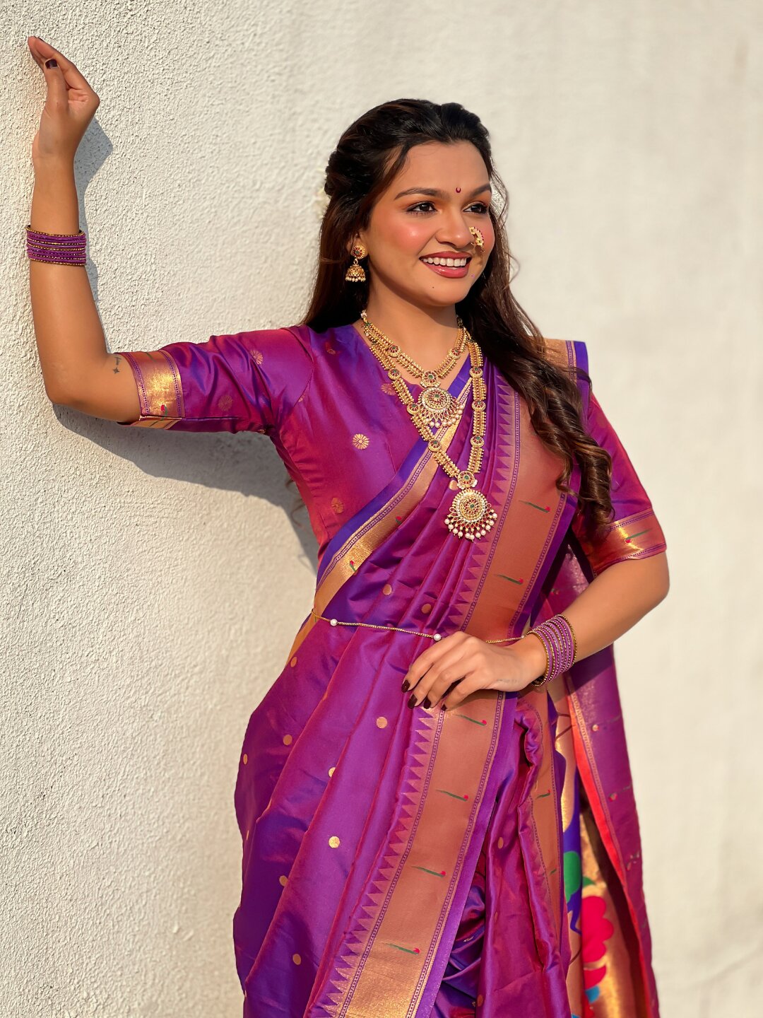 Purple Nauvari Pathani Silk Zari Woven Muniya Border Saree