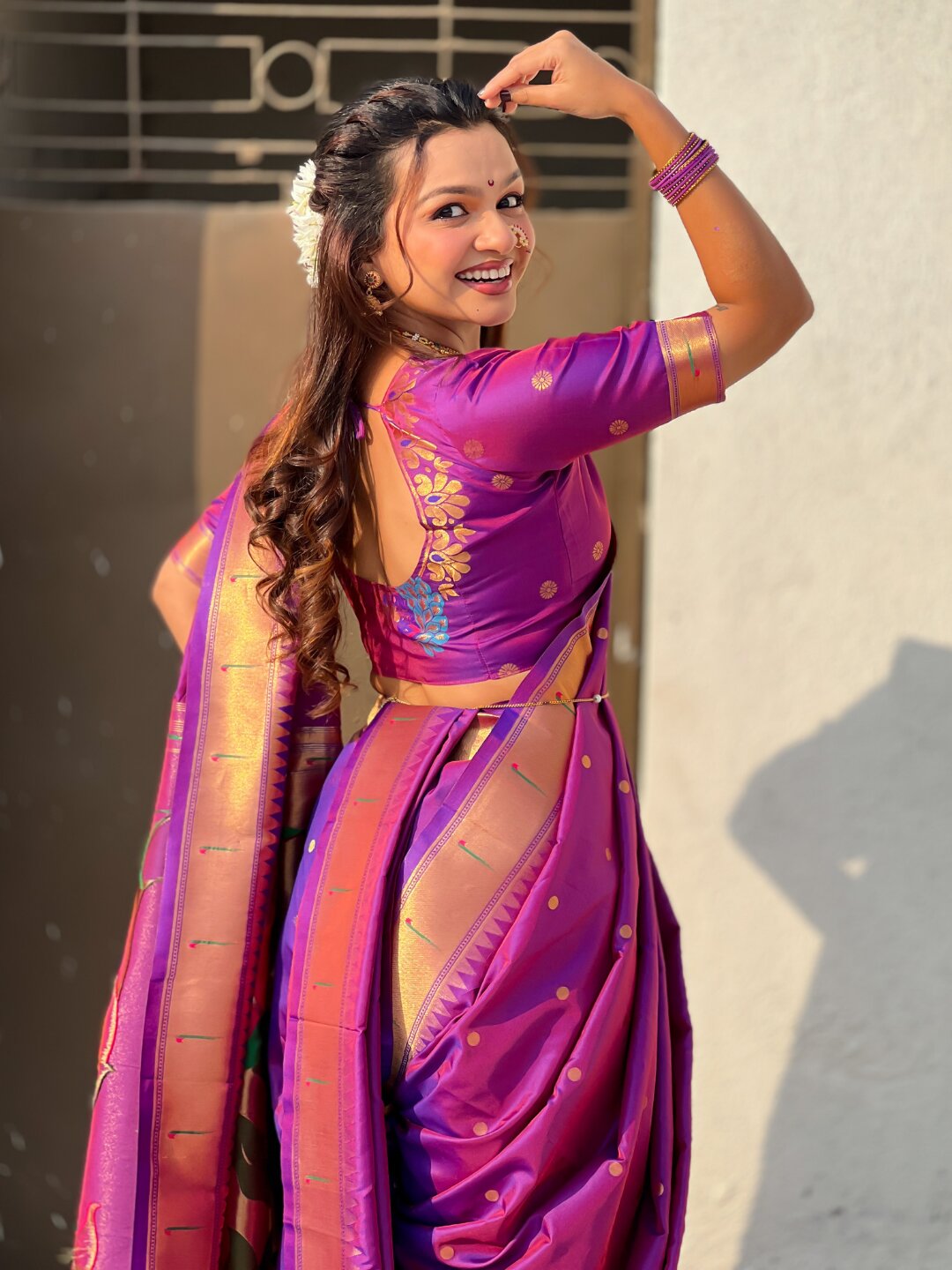 Purple Nauvari Pathani Silk Zari Woven Muniya Border Saree