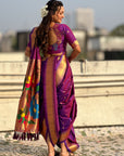 Purple Nauvari Pathani Silk Zari Woven Muniya Border Saree
