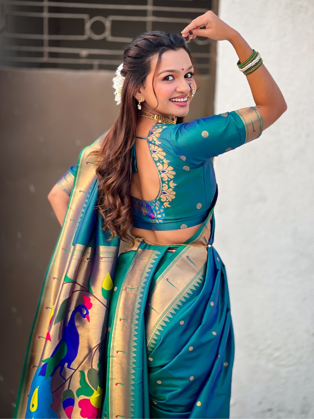 Peacock Blue Nauvari Pathani Silk Zari Woven Muniya Border Saree
