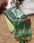 Green fabric with deer design on a textured surface