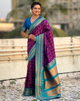 Purple Soft Checks Pattern and Contrast Zigzag Border Silk Saree