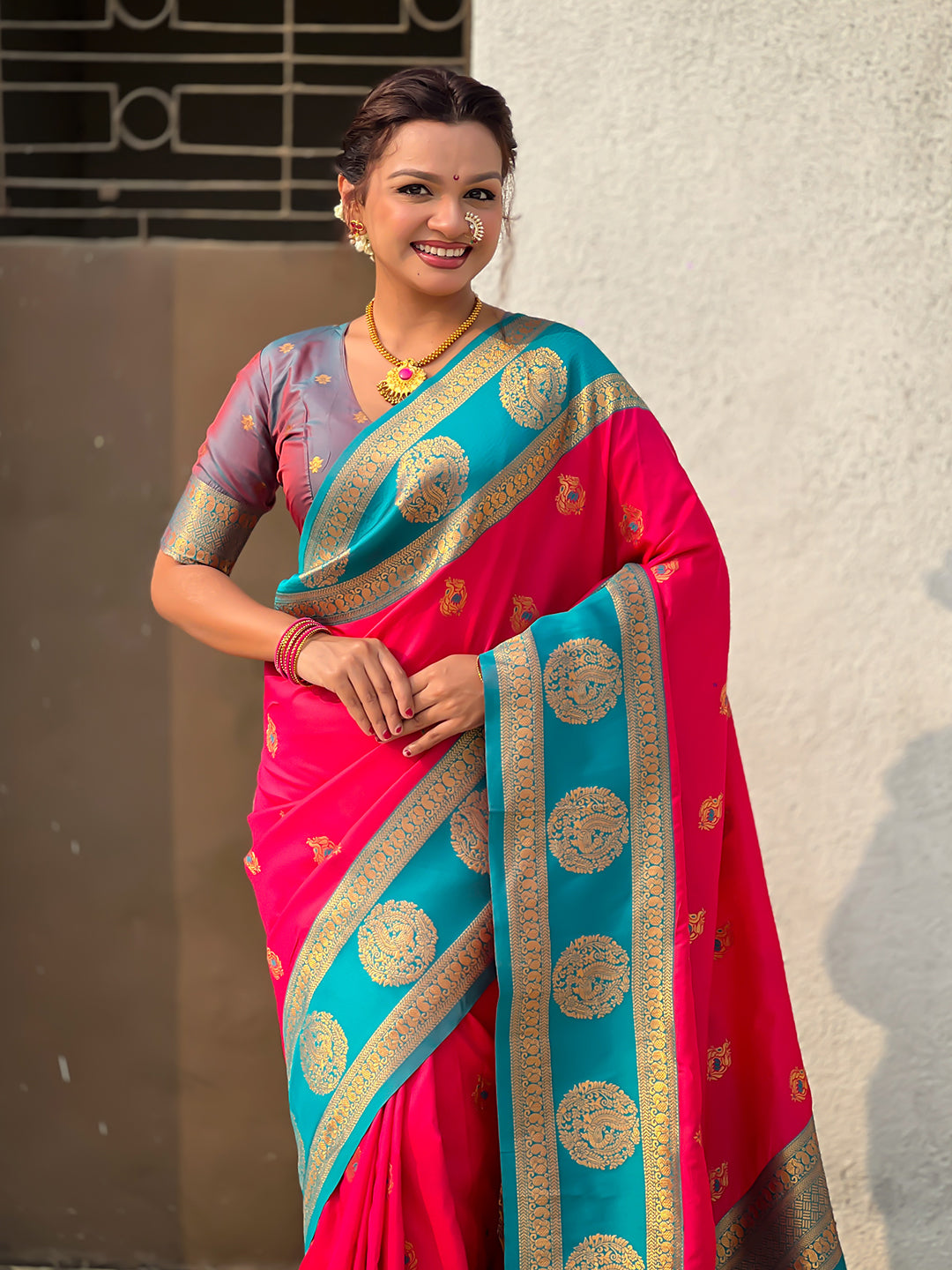 Rani Pink Soft Silk Peacock Border Motifs Zari Woven Saree