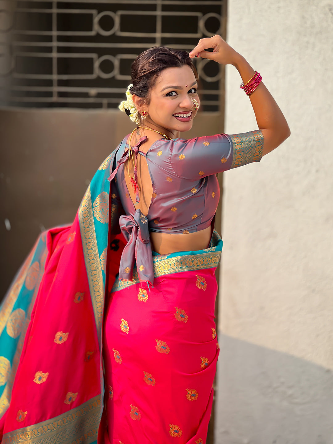 Rani Pink Soft Silk Peacock Border Motifs Zari Woven Saree