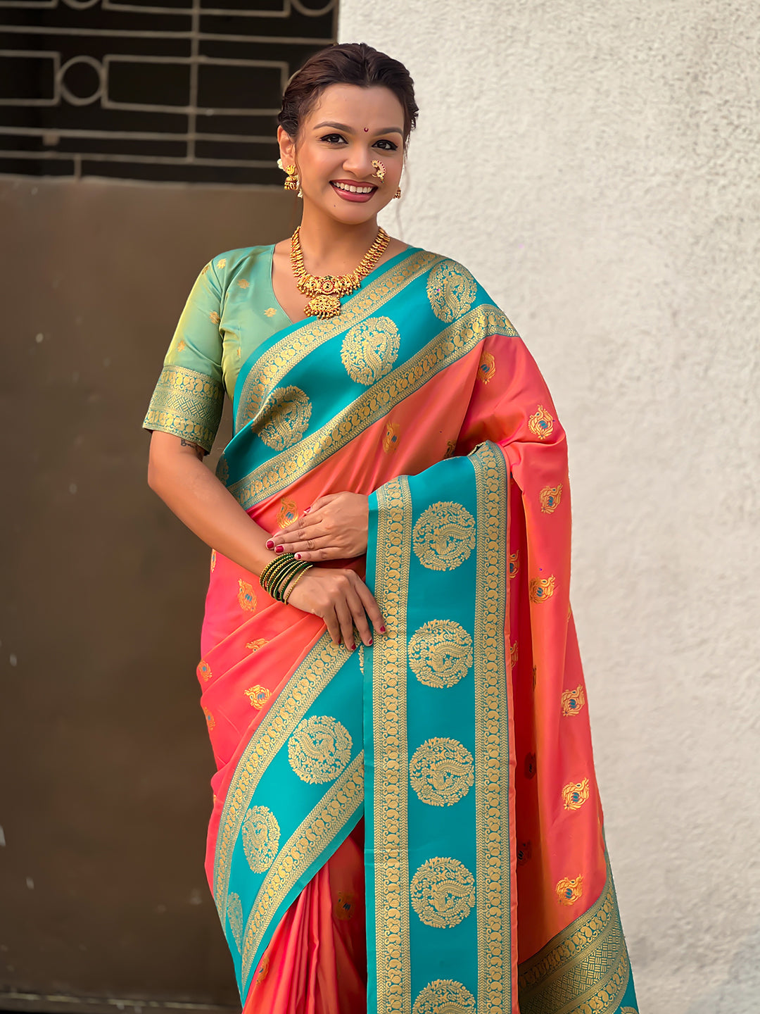 Peach Soft Silk Peacock Border Motifs Zari Woven Saree