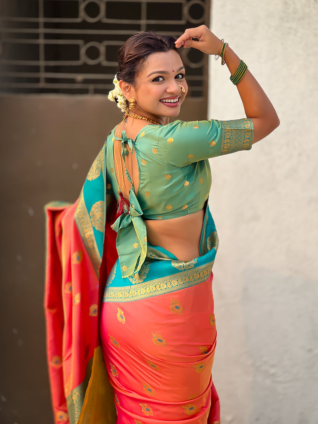 Peach Soft Silk Peacock Border Motifs Zari Woven Saree