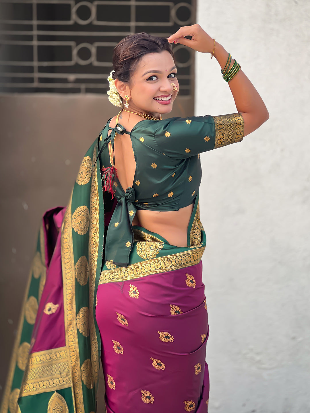Wine Soft Silk Peacock Border Motifs Zari Woven Saree